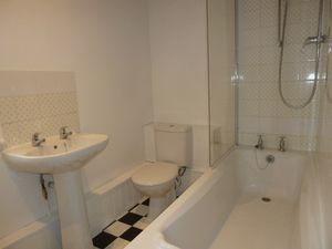 Bathroom with power shower- click for photo gallery
